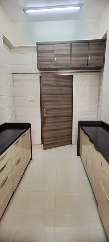 Kitchen in 3 BHK Apartment at Bhakti Residency Chembur, Chembur – for Rent
