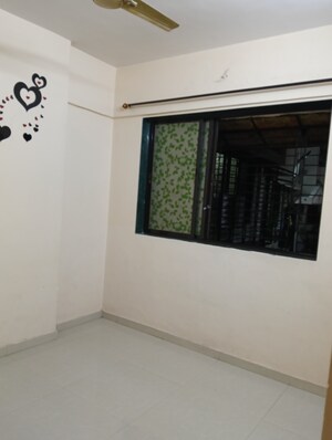 Bedroom in 1 BHK Apartment at Dombivli West – for Sale