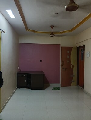 Living Room in 1 BHK Apartment at Dombivli West – for Sale