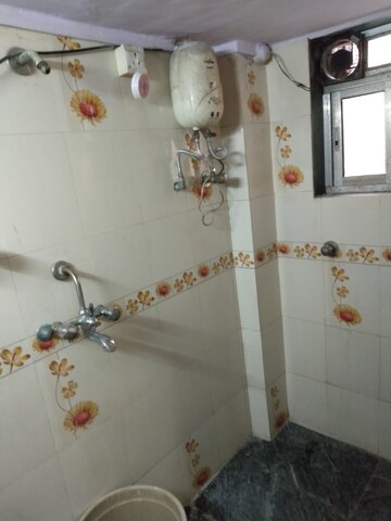 Bathroom in 2 BHK Apartment at Dheeraj Valley, Goregaon East – for Rent