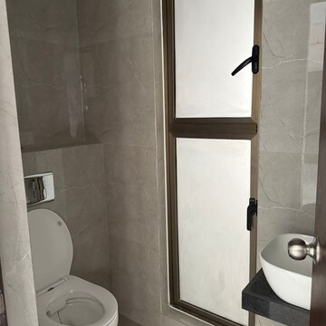 Bathroom in 1 BHK Apartment at Raymond Ten X Habitat, Swastik Garden – for Rent