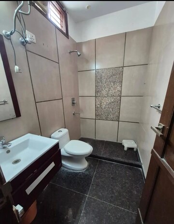 Bathroom in 3 BHK Builder Floor at Panchsheel Enclave – for Rent