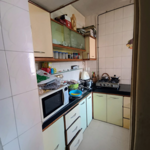 Kitchen in 3 BHK Apartment at Siddhivinayak Tower Runwal Nagar, Kolbad – for Sale