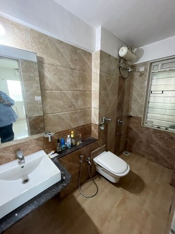 Bathroom in 3 BHK Apartment at Tilak Nagar Building, Tilak Nagar – for Rent