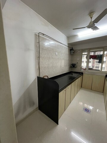 Kitchen in 3 BHK Apartment at Tilak Nagar Building, Tilak Nagar – for Rent