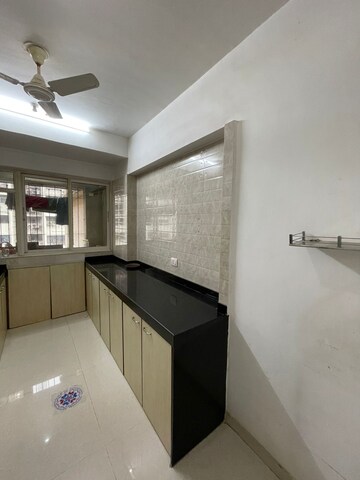 Kitchen in 3 BHK Apartment at Tilak Nagar Building, Tilak Nagar – for Rent