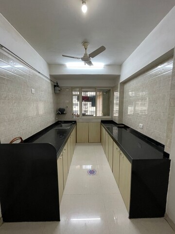 Kitchen in 3 BHK Apartment at Tilak Nagar Building, Tilak Nagar – for Rent