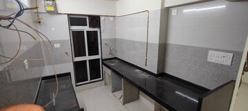 Kitchen in 1 BHK Builder Floor at Dinaco Darshan CHS, Dahisar West – for Rent