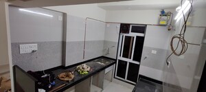 Kitchen in 1 BHK Builder Floor at Dinaco Darshan CHS, Dahisar West – for Sale