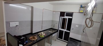 Kitchen in 1 BHK Builder Floor at Dinaco Darshan CHS, Dahisar West – for Sale