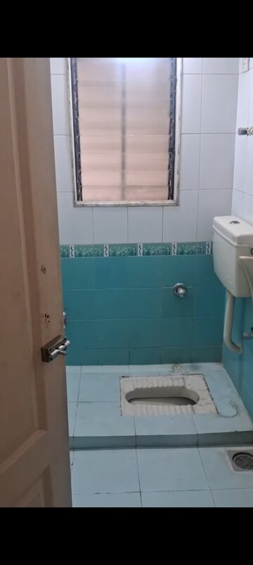 Bathroom in 1 BHK Builder Floor at Pooja Enclave Kandivali, Kandivali West – for Rent