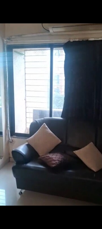 Living Room in 1 BHK Builder Floor at Pooja Enclave Kandivali, Kandivali West – for Rent