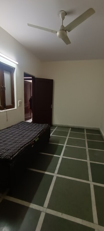Bedroom in 1.5 BHK Builder Floor at Kalkaji – for Rent
