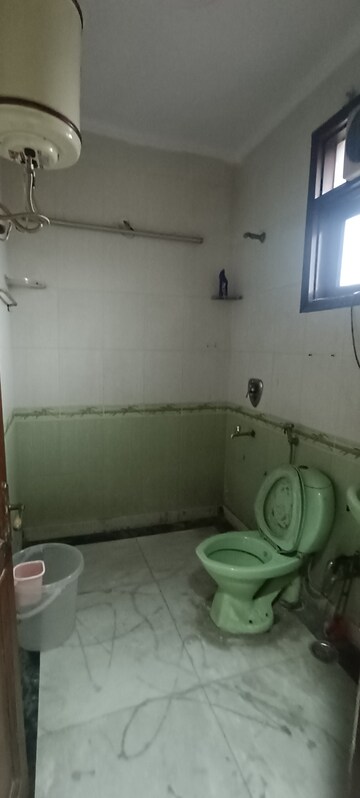Bathroom in 1.5 BHK Builder Floor at Kalkaji – for Rent