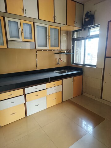 Kitchen in 3 BHK Apartment at Cosmos Tower, Panchsheel Nagar – for Rent