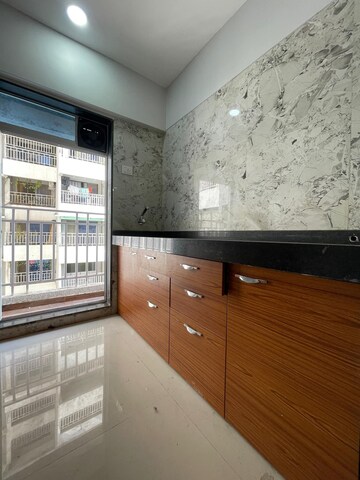 Kitchen in 2 BHK Apartment at Classic Heights Vasai, Vasai West – for Rent