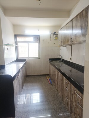 Kitchen in 2 BHK Apartment at Kalpataru Hills Phase II, Manpada – for Sale
