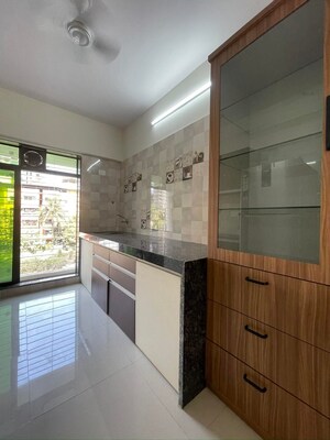 Kitchen in 2 BHK Apartment at Rajhans Moonstone, Vasai West – for Sale