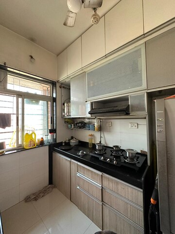 Kitchen in 2 BHK Apartment at Vasant Fiona, Pokhran Road No Two – for Sale