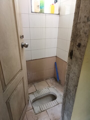 Bathroom in 1 BHK Apartment at Cosmos Heritage, Manpada – for Rent