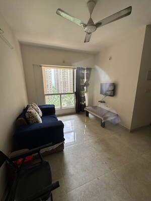 Living Room in 1.5 BHK Apartment at Lodha Amara, Kolshet Road – for Sale