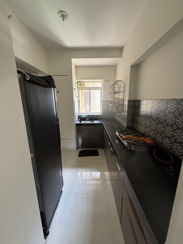 Kitchen in 1.5 BHK Apartment at Lodha Amara, Kolshet Road – for Sale