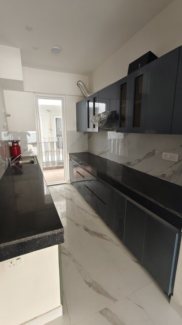 Kitchen in 3 BHK Apartment at M3M Soulitude, Sector 89 – for Rent