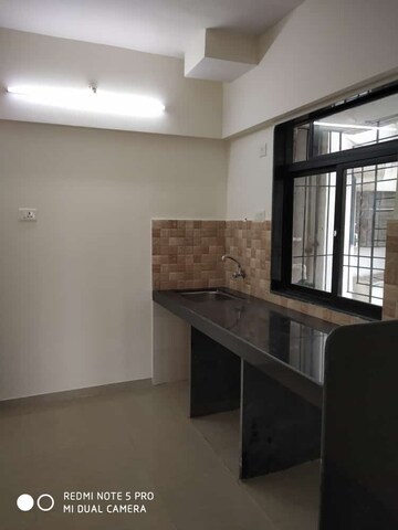 Kitchen in 2 BHK Apartment at Maison Tarangan, Kasarvadavali – for Rent