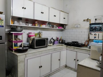 Kitchen in 2 BHK Apartment at Kailash Nath Som Vihar, Rama Krishna Puram – for Sale