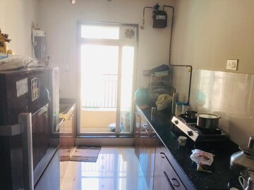 Kitchen in 2 BHK Apartment at Rustomjee Urbania Azziano, Thane West – for Rent