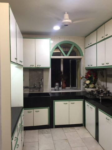 Kitchen in 2 BHK Apartment at Swan Lake Apartment, Khar West – for Rent