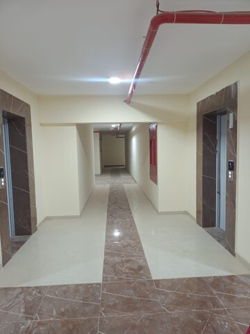 Building Lobby in 2 BHK Apartment at Mahavir Kalpavruksha, Ghodbunder Road – for Sale