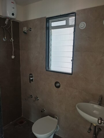 Bathroom in 2 BHK Apartment at Mahavir Kalpavruksha, Ghodbunder Road – for Sale