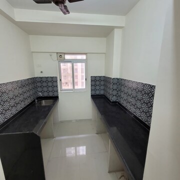 Kitchen in 2 BHK Apartment at Raymond Ten X Habitat, Pokhran Road No Two – for Rent