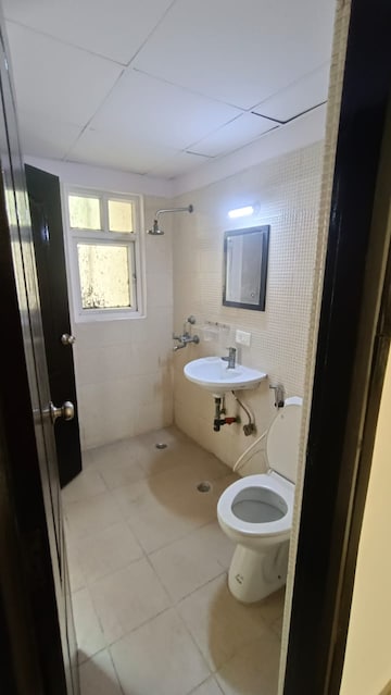 Bathroom in 2 BHK Apartment at Aditya Urban Casa, Sector 78 – for Rent