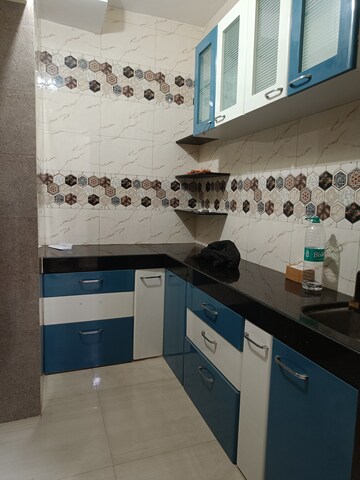 Kitchen in 1 RK Apartment at Summit Apartment, Goregaon East – for Sale