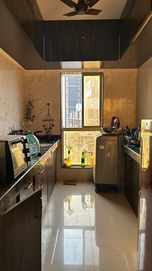 Kitchen in 2 BHK Apartment at Dharti Pressidio, Kandivali West – for Sale