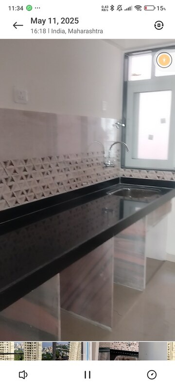 Kitchen in 2 BHK Apartment at Mahavir Square, Manpada – for Sale