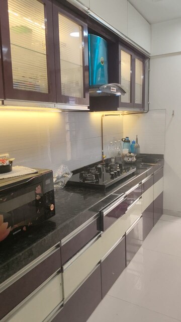 Kitchen in 2 BHK Apartment at Rustomjee Azziano Wing D, Thane West – for Sale