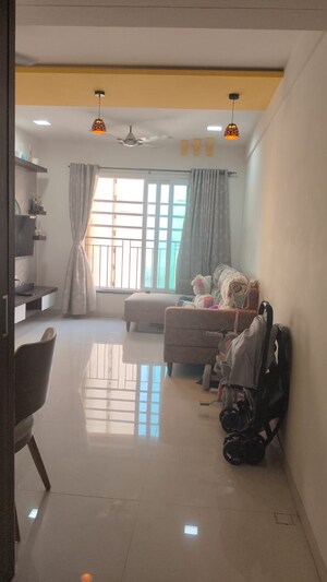 Living Room in 2 BHK Apartment at Rustomjee Azziano Wing D, Thane West – for Sale