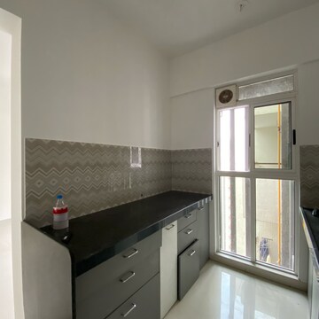 Kitchen in 2 BHK Apartment at Lodha Codename Premier, Mangaon – for Rent