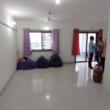 Living Room in 2 BHK Apartment at Sudhir Mandke Advantage CHS, Lulla Nagar – for Rent