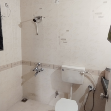 Bathroom in 2 BHK Apartment at Sudhir Mandke Advantage CHS, Lulla Nagar – for Rent