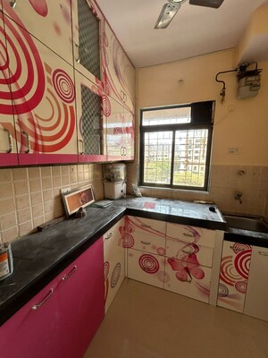 Kitchen in 2 BHK Apartment at Dedhia Platinum Lawns, Ghodbunder Road – for Sale