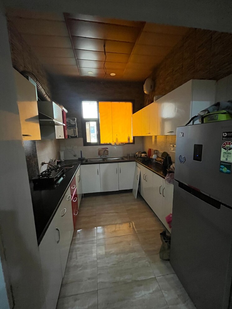 Kitchen, paradigm-business-hermitage-park 3 Bedroom 1560 Sq.Ft. Apartment In Dhakoli Zirakpur 8962522