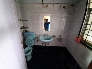 Bathroom in 2 BHK Apartment at Woodland Avenue, Kothrud – for Rent