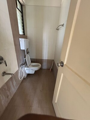 Bathroom in 2 BHK Apartment at Mahavir Kalpavruksha, Ghodbunder Road – for Sale