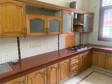 Kitchen in 4 BHK Apartment at DLF Belvedere Towers, Sector 24 – for Rent