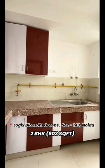 Kitchen in 2 BHK Apartment at Logix Blossom Greens, Sector 143 – for Sale