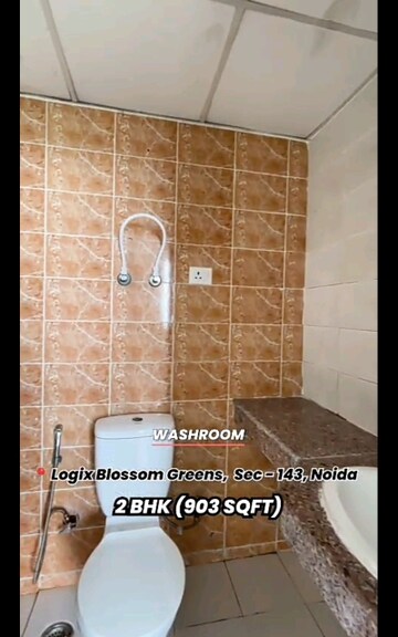 Bathroom in 2 BHK Apartment at Logix Blossom Greens, Sector 143 – for Sale